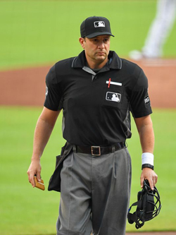 Why Do Umpires Wear Black or Blue? - Ump Junk - Officials Gear